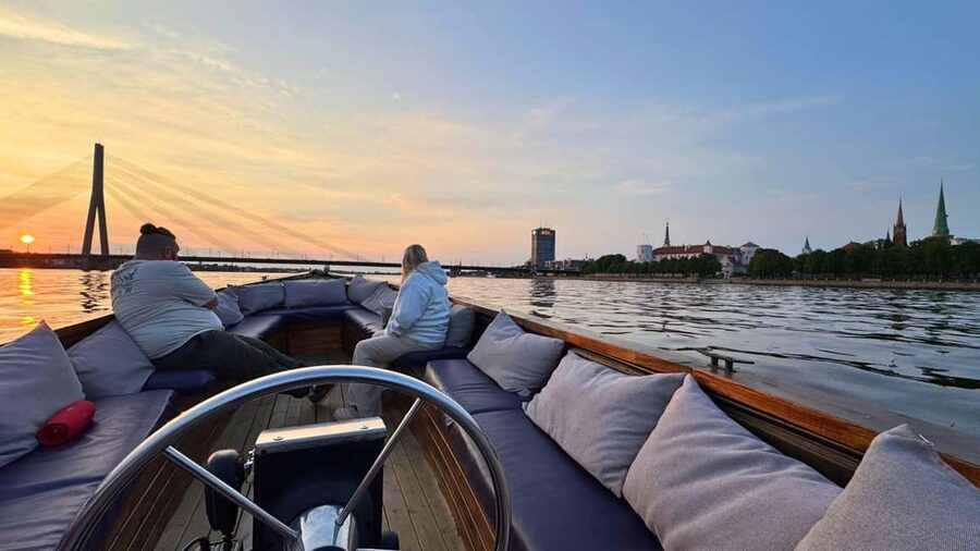 Riga: Canal Boat Tour with Welcome Drink & Audio Guide - The audio guide, seating, and sound