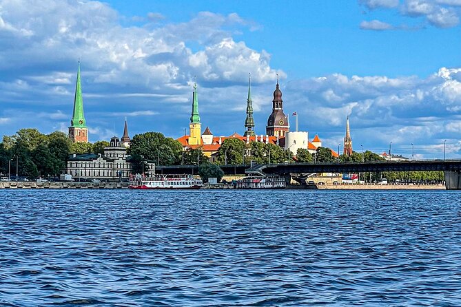 Riga Sightseeing Tour by Canal Boat with Audioguide - Central Market and the National Library