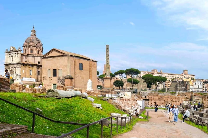 Rome: Colosseum, Forum, Palatine Hill Entry, and Audio Guide - Walking through the Roman Forum