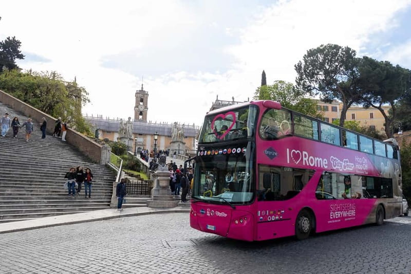 Rome: Hop-on Hop-off Sightseeing Bus Tour with Audioguide - How the audio guide and bus seating affect the ride