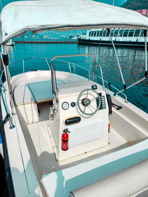 Self Drive Boat Lake Como (7pax): be a Captain, no License! - Villas, hotels, and mountain views from the water