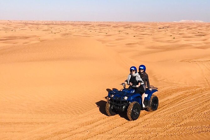 Self Drive Quad Bike in Open Desert With Sand Boarding and Camels - Sandboarding after the quad ride