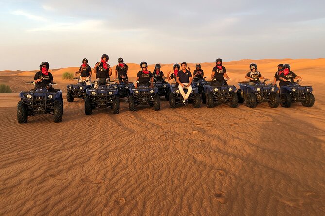 Self-drive Quad Bike with Sand Boarding and Camel Ride in Dubai - Sand boarding adds a playful second act
