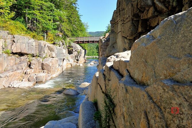 Self-Guided Audio Driving Tour in Kancamagus Highway - Lower Falls for river views and swimming