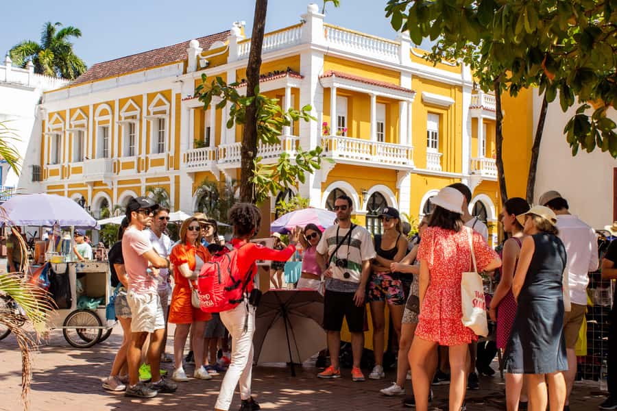 Shared Cartagena Old City Tour with Wireless Audio System - Plaza de los Coches and colonial trade