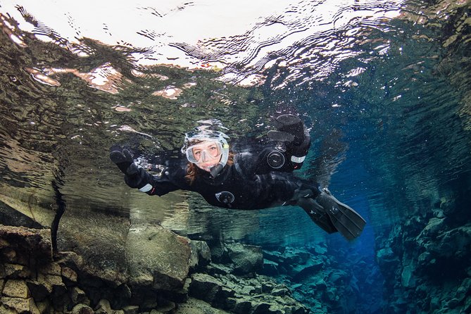 Silfra: Hot and Cold Snorkeling and Spa Tour - Self Drive - Warming up with chocolate and cookies