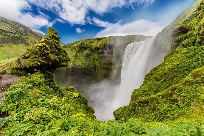 South Coast Iceland from Reykjavik with Guide & Touchscreen Audio - Skógafoss, a waterfall with a high viewpoint