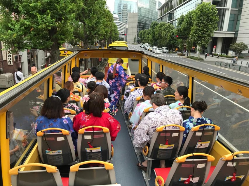 Tokyo: 60min Panoramic Open Top Bus Tour with Audio Guide - Crossing Rainbow Bridge toward Tokyo Bay