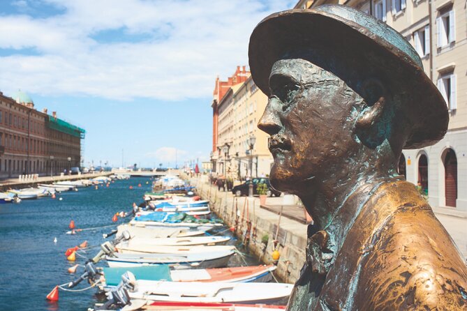 Trieste Walking Tour with Audio and Written Guide by a Local - Piazza della Borsa explains Trieste’s commercial side